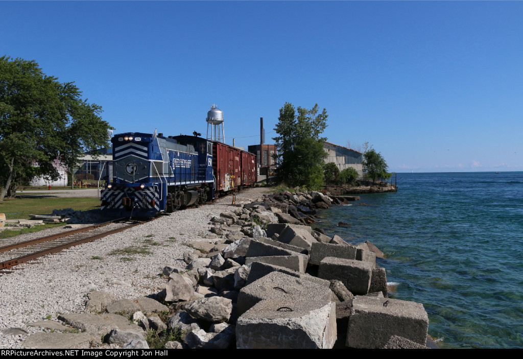 Lake Huron stretches to the horizon as 1501 works DunnPaper